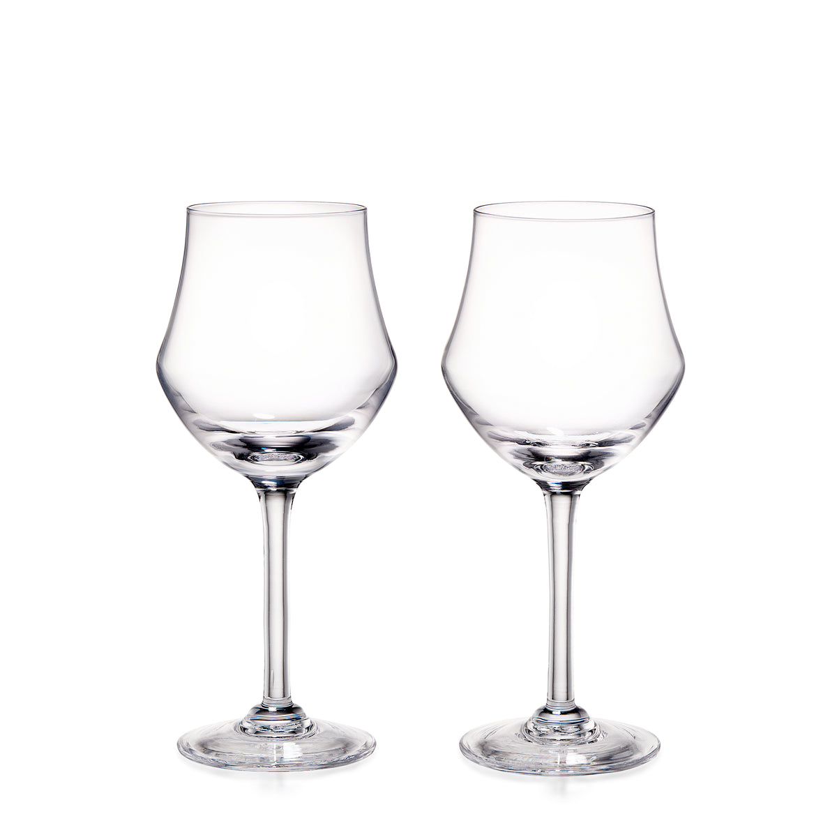 Two clear glass wine glasses with tulip-shaped bowls and long stems on white background.