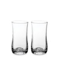 Two clear glass tumblers with curved sides and weighted bases displayed side by side.