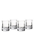 Set of four clear glass whiskey tumblers with weighted bases and tapered sides.