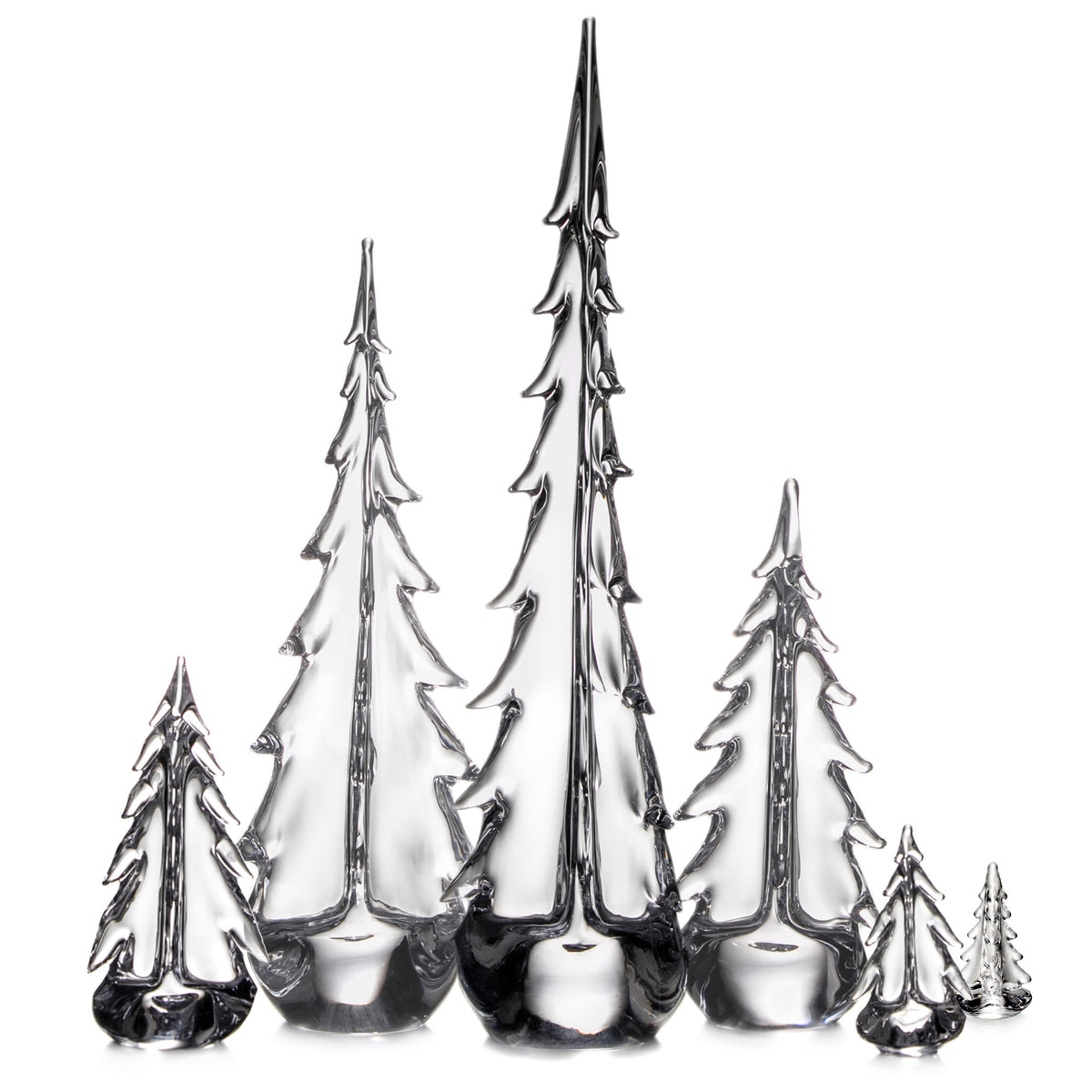 Six metallic evergreen tree sculptures in varying heights arranged in a group against a white background.