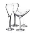 Four clear glass stemware pieces including two flute glasses and two coupe glasses arranged on white background.