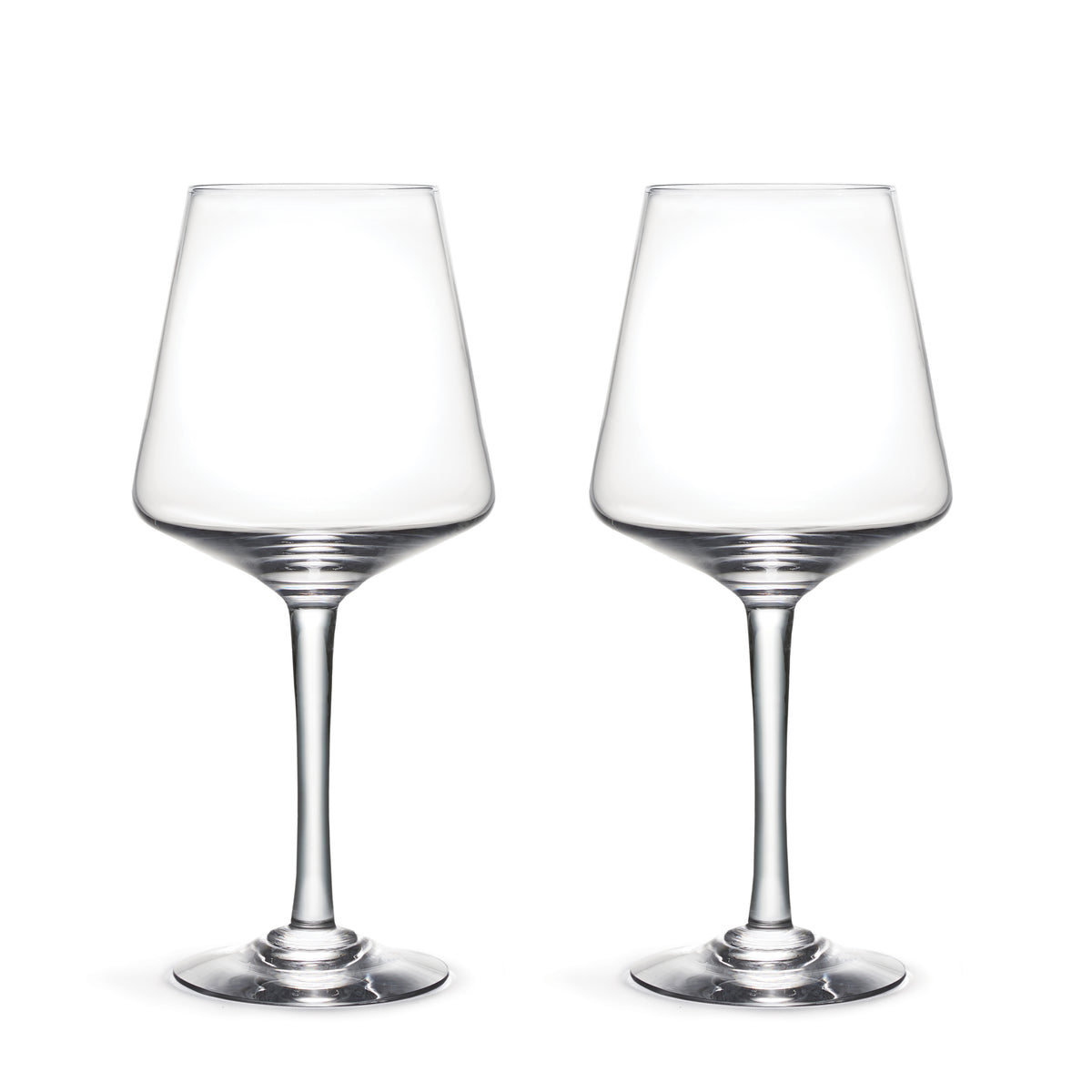 Two clear wine glasses with tapered bowls and thin stems on a white background.