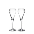 Two clear glass champagne flutes with tapered bowls and thin stems on round bases.