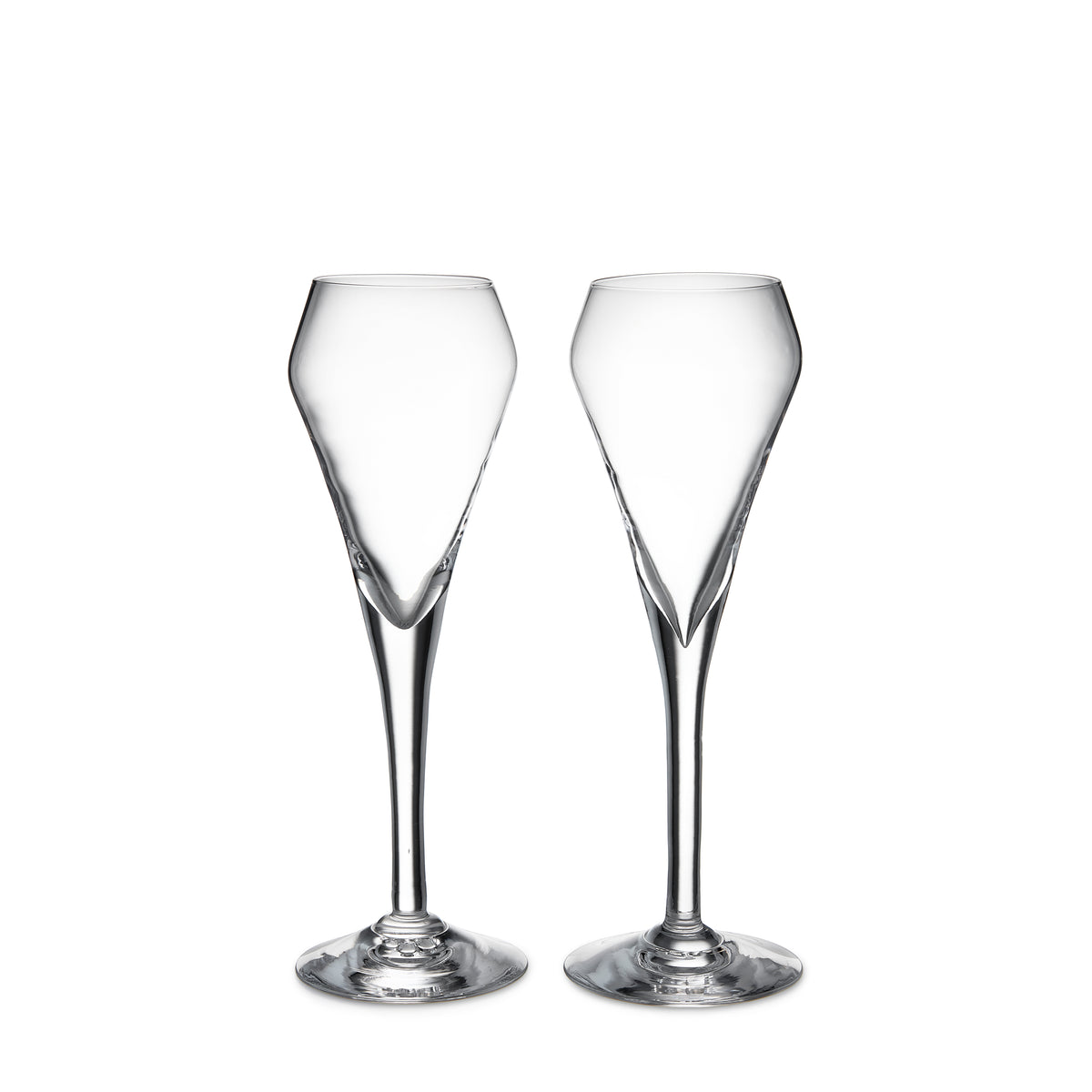 Two clear glass champagne flutes with tapered bowls and thin stems on round bases.