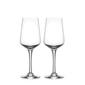 Two clear wine glasses with tapered bowls and thin stems on white background.