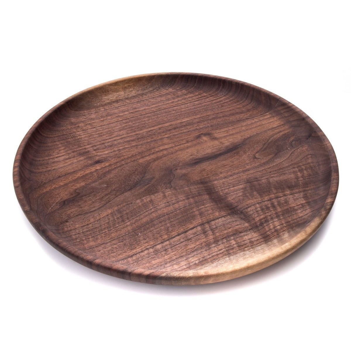 Round wooden tray with dark brown finish and visible grain pattern, shallow raised edge on white background.