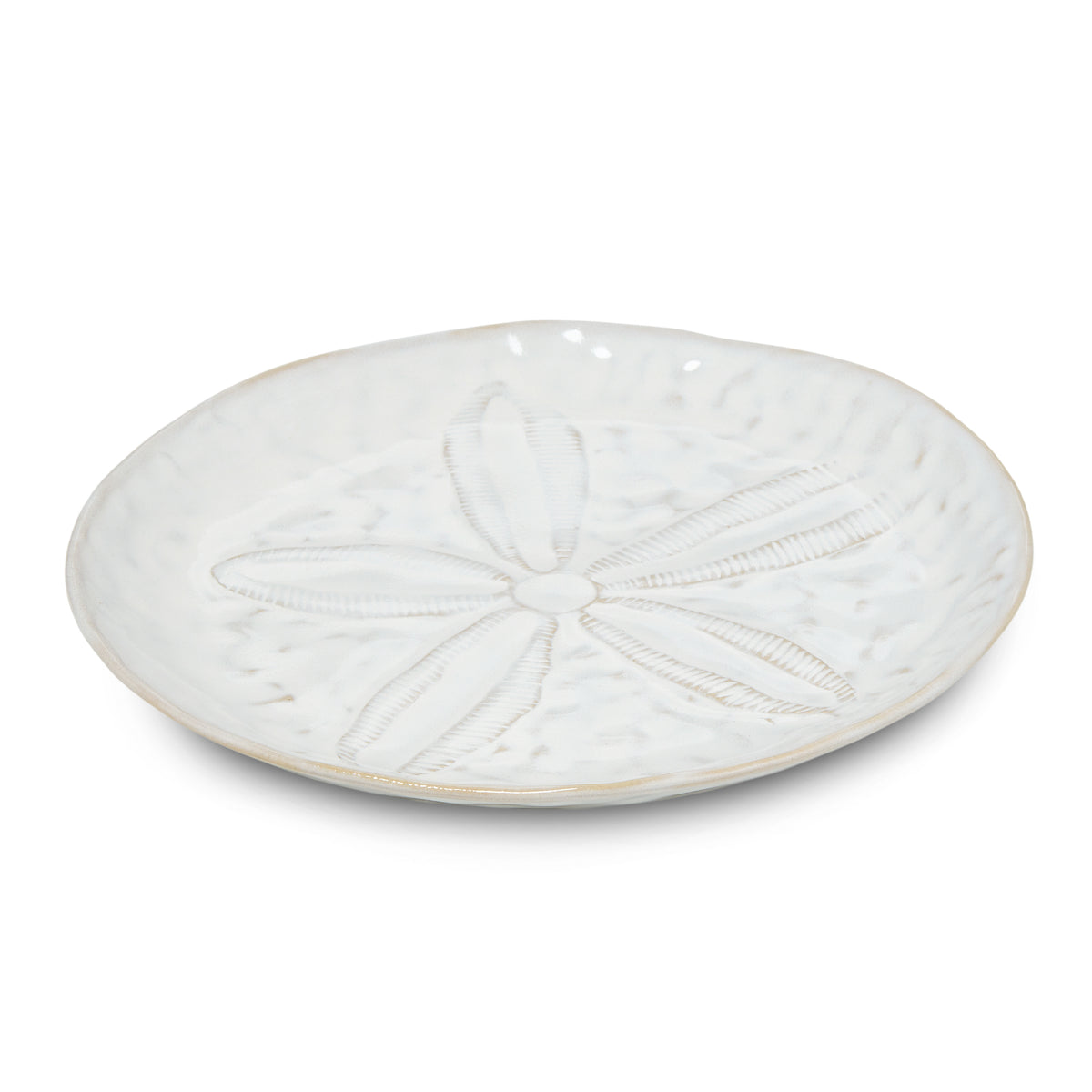 White side plate with sand dollar relief design and beige rim.