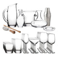 Glass bar set with pitcher, cocktail shaker, mixing bowl, bar tools, and assorted drinking glasses.