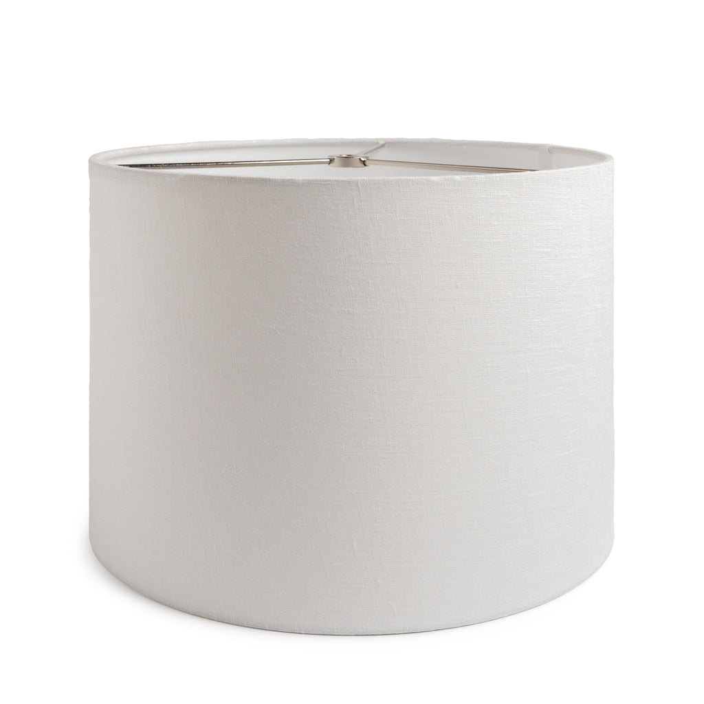 White linen barrel-shaped lamp shade with metal top ring and seam detail.